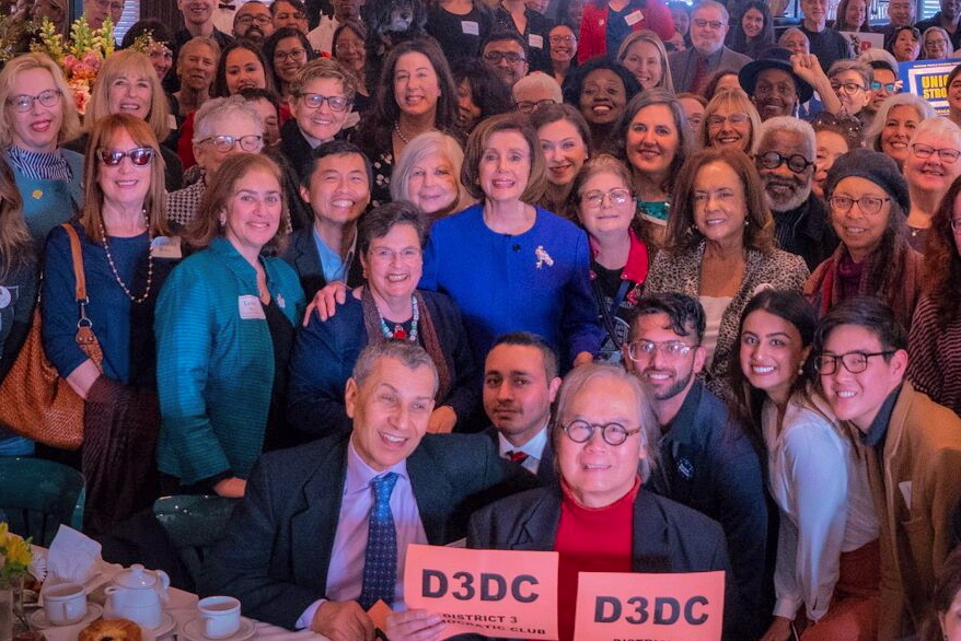 Members of D3DC surrounding House Speaker Nancy Pelosi